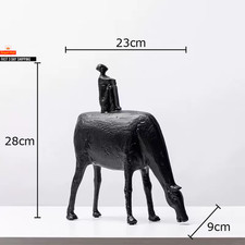 Statua cowherd argento