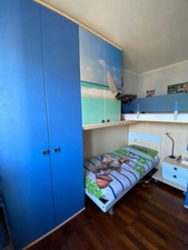 Camera ragazzi con letto a