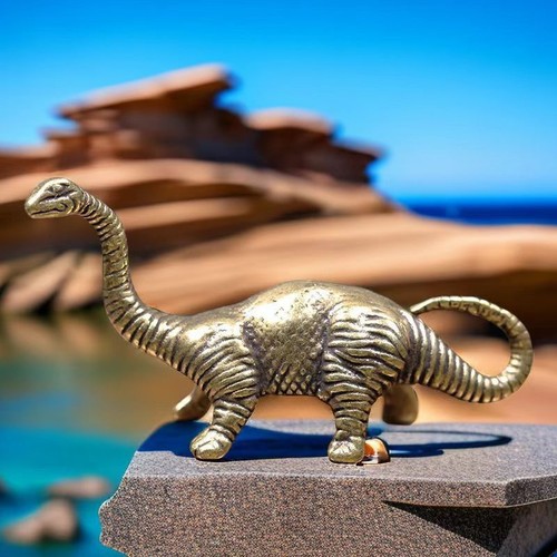 Statua dinosauro ottone