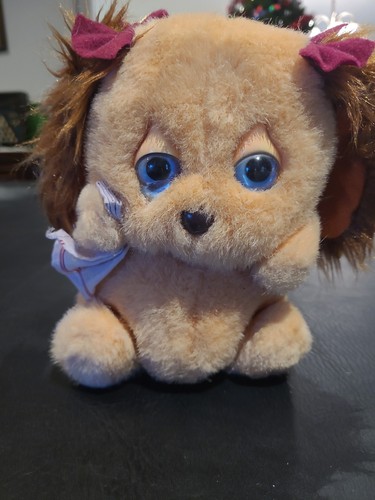 Peluche pupazzo occhi tristi