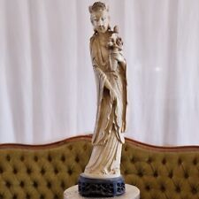 Statuina di donna orientale in simil avorio con basamento il legno traforato
