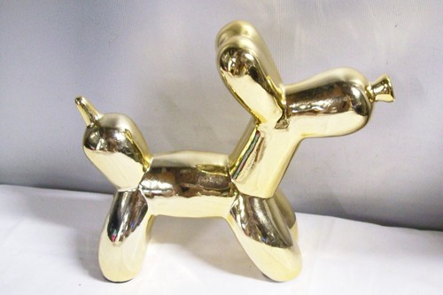Statuina scultura cane