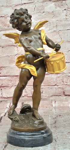 Scultura putti batterista