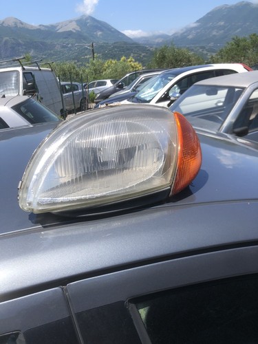 Faro anteriore con freccia - sx,