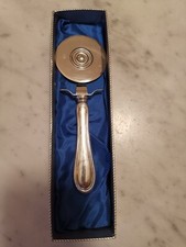 taglia pizza di qualità manico argento 800, rotella in acciaio inox, mai usata