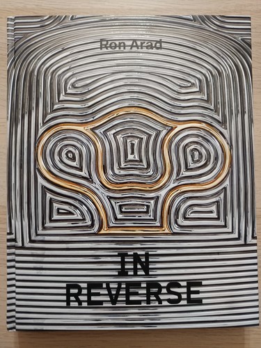 Reverse ron arad - "in,