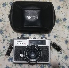 Ricoh 500 macchina fotografica 35mm rullini pellicola fotocamera vintage LEGGERE