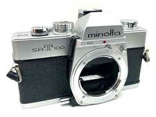 Minolta SRT 100 SLR con