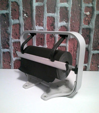 SVOLGITORE CON TAGLIERINA ORIZZONTALE DA TAVOLO  UNWINDING MACHINE WITH CUTTER