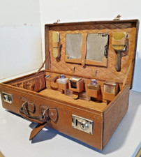 Valigia da toilette da viaggio in pelle marrone con set di accessori anni '50
