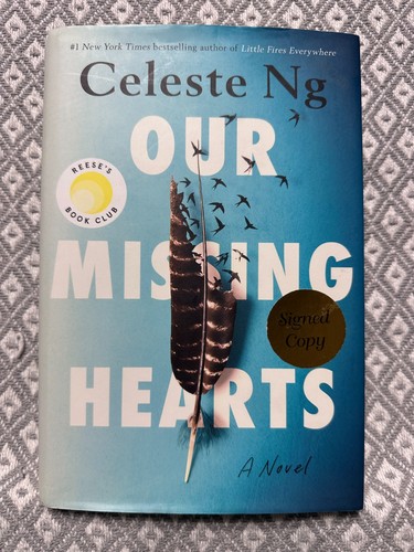 Our missing hearts signed - our,