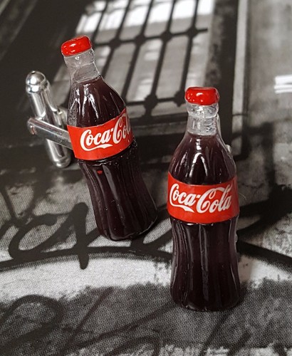 Gemelli coca cola - a, mano