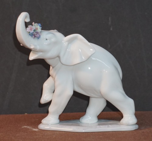 Thief elephant porcelain - thief-elephant,