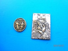 antica medaglia votiva e targa