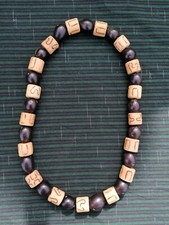 Collana in semi/cocco/legno