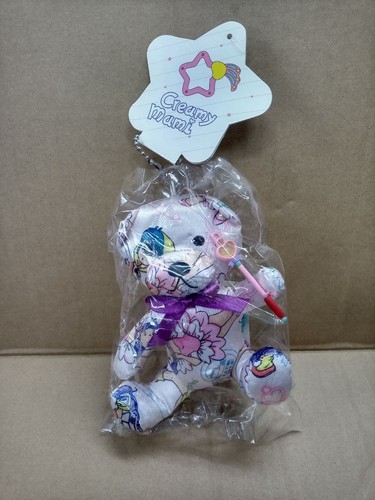 Peluche cremoso - aperto),