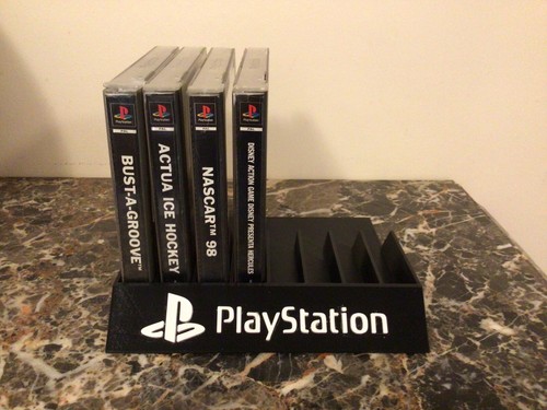 Sony playstation game stand - game,