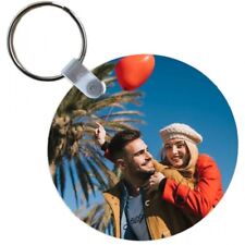 Portachiavi rotondo personalizzabile con foto a stampa sublimatica .