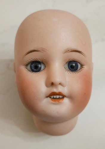 Tête poupée ancienne - de,