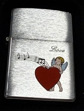 ZIPPO 2003 LOVE CUPID CON MUSICA CUORE ACCENDINO CROMATO SPAZZOLATO SIGILLATO IN SCATOLA X839