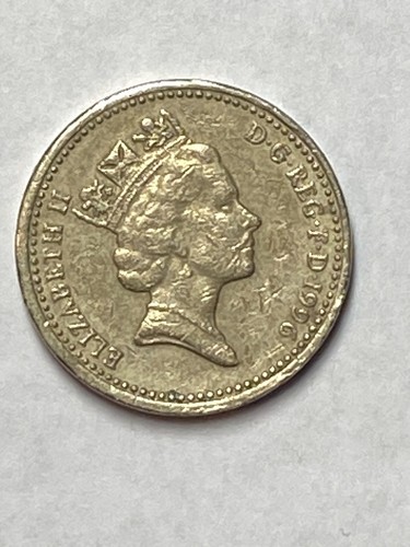 Moneta una sterlina inglese - moneta,