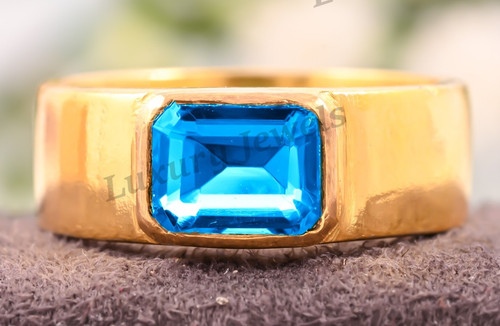 Anello uomo topazio blu