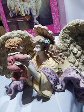 angelo windup tesori classici con angolo bambino seduto musica angelo suona canzone