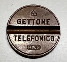 GETTONE TELEFONICO CMM 7806 CON RETRO A ROVESCIO: TELEFONO GIRATO, RARO, BELLO.