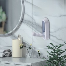 Ganci da parete pieghevoli