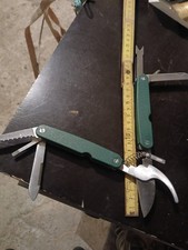 UTENSILE MULTIUSO 7  FUNZIONI CON FORBICE CON ASTUCCIO TIPO SVIZZERO