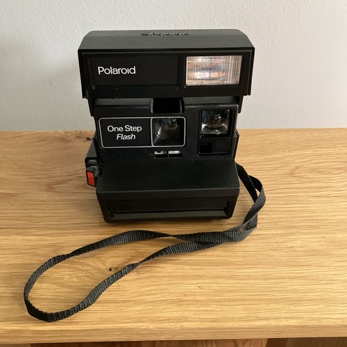 Polaroid one step - step, flash
