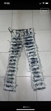 jeans strappati
