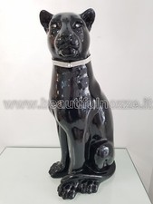 LEOPARDO PANTERA SEDUTO IN