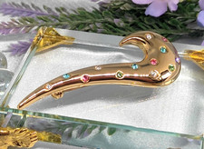 Spilla tono oro strass