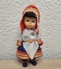 Simpatica bambola di plastica