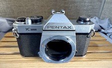 Fotocamera PENTAX K 1000 35mm solo corpo - non testata ma l'otturatore funziona.
