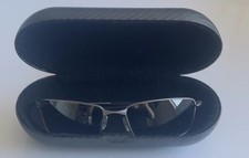 Oakley Whisker titanio lucido montatura grigio totanio lenti polarizzate marrone 12-965