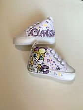 Scarpette neonato culla