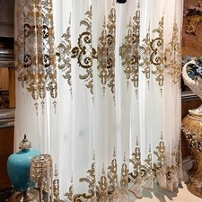 Tende in tulle ricamate stile
