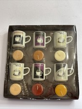 Candele profumate al caffè in
