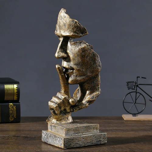 Scultura volto silenzio oro