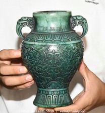 Vaso bottiglia testa di bestia