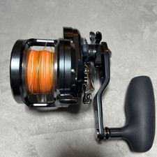 Mulinello esca OCEA JIGGER nero funzione blocco libero manico destro