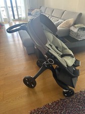 Passeggino usato Stokke colore verde completo di fodere e sacca