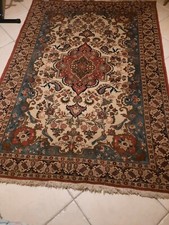 Tappeto persiano usato come