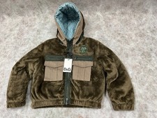 Giacca Dolce & Gabbana D&G Junior con cappuccio 6 anni.Acrobatico ragazzo che vola nel cielo