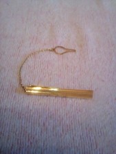 Fermacravatta d'argento dorato, anni 70, vintage.