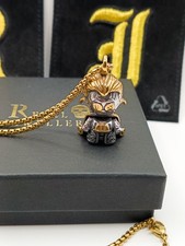 Collana oro supereroe mantello