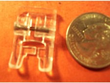 Piedino a scatto trasparente