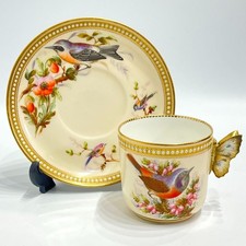 Antica tazza e piattino da